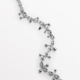 Cadena Calabrote a fuego de piercings